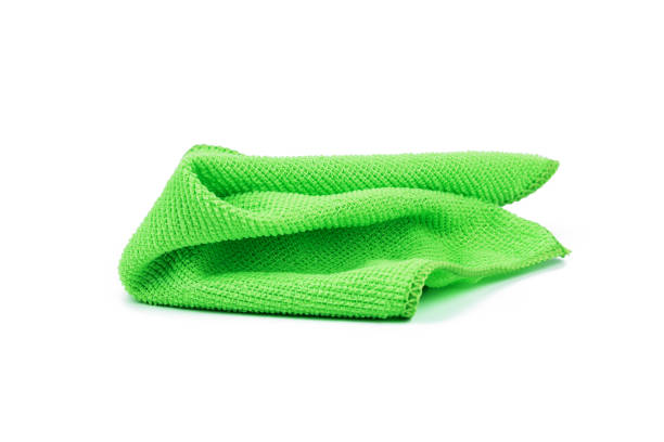 istock microfiber towel cloth isolated on white background. fabric for dusting and cleaning cut out 1329506115
