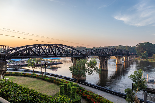 Landscape of Bridge River Kwai at Kanchanaburi, Thailand in morning time. It is a bridge built since World War II and Is a famous place and a tourist destination