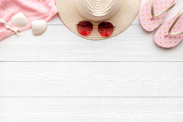 istock Tropical beach pattern with sraw hat with sunglasses. Top view 1329509434