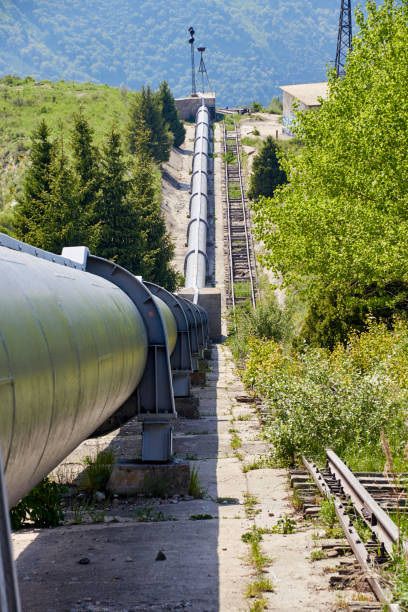 istock pipeline from a mountain river leading to a hydroelectric power station 1329510407