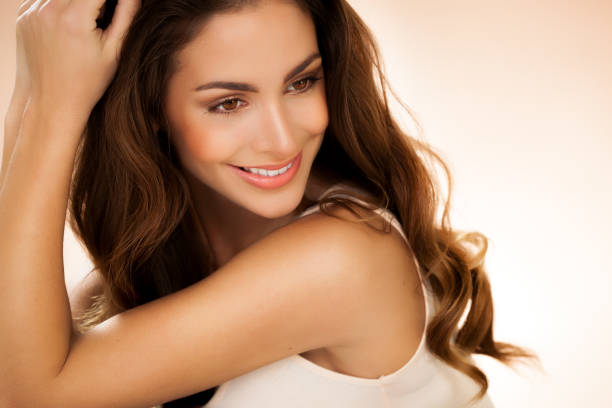 istock Woman With Long Brown Hair 1329513136