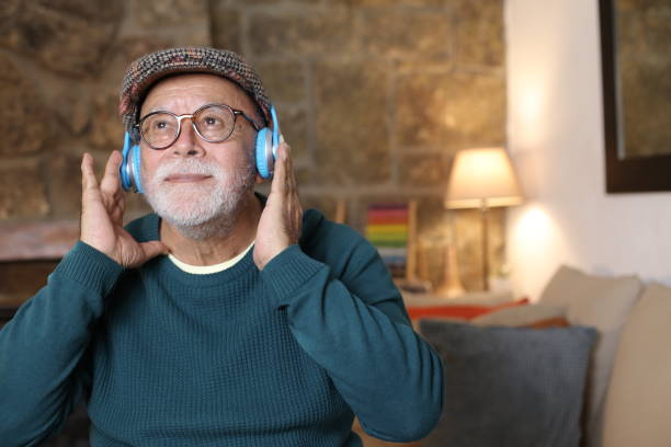 istock Senior man listening to music 1329516328