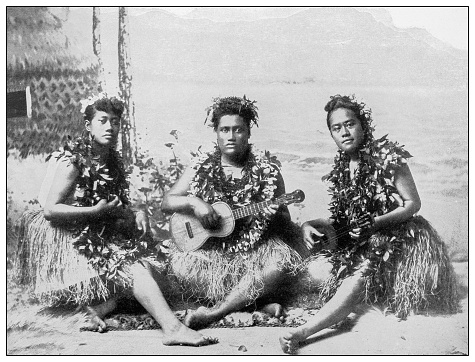Antique black and white photograph of people from islands in the Caribbean and in the Pacific Ocean; Cuba, Hawaii, Philippines and others: Hula girls, Honolulu, Hawaii