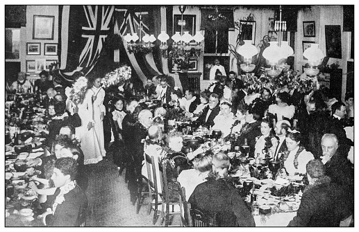 Antique black and white photograph of people from islands in the Caribbean and in the Pacific Ocean; Cuba, Hawaii, Philippines and others: Banquet in Honolulu in honor of the American commissioners, Hawaii