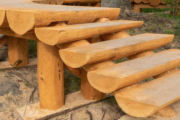 istock Wooden stairway made of half-logs, park pathway 1329521726