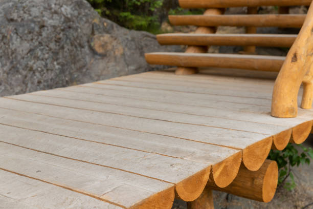 istock Wooden pathway and stairway made of half-logs 1329521728