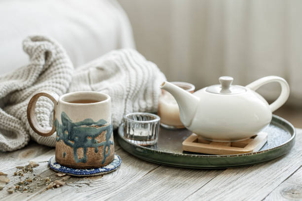 istock Home still life with a ceramic cup and teapot in the Scandinavian style. 1329524525