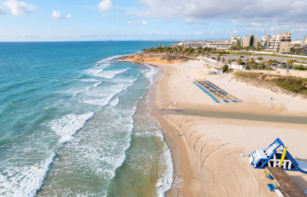 istock Aerial view sandy beach and Mediterranean Sea. Spain 1329524639