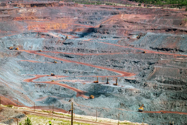 istock Iron ore extraction in the quarry of the Mikhailovsky mining and processing plant 1329525987