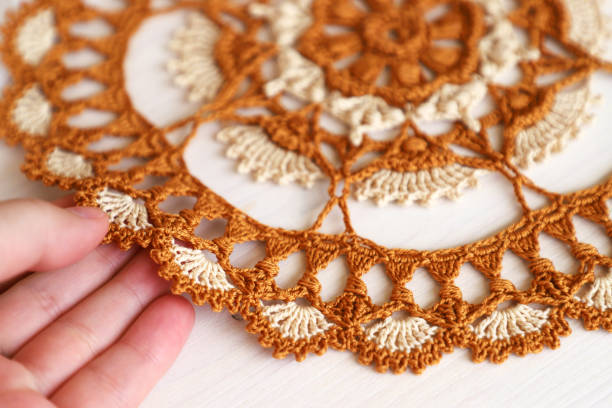 istock Golden crochet doily 1329529814
