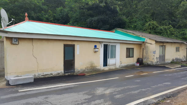 A farmhouse next to a road in Korea