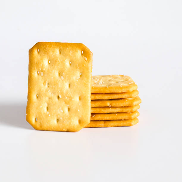 istock Dry cracker cookies or biscuits on background, concept of food. 1329533466
