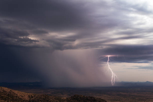 istock Lightning and heavy rain from a monsoon storm 1329535505