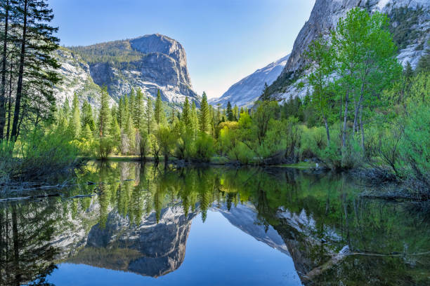 Mirror Lake Yosemite National Park Mirror Lake in Yosemite National Park in spring full of water. mirror lake stock pictures, royalty-free photos & images