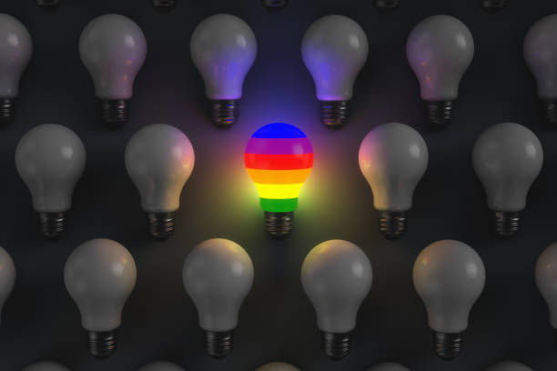 istock Illustration for LGBT topics. Glowing light bulb in rainbow style 1329538139