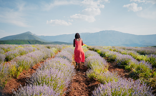 A woman enjoys lavender field