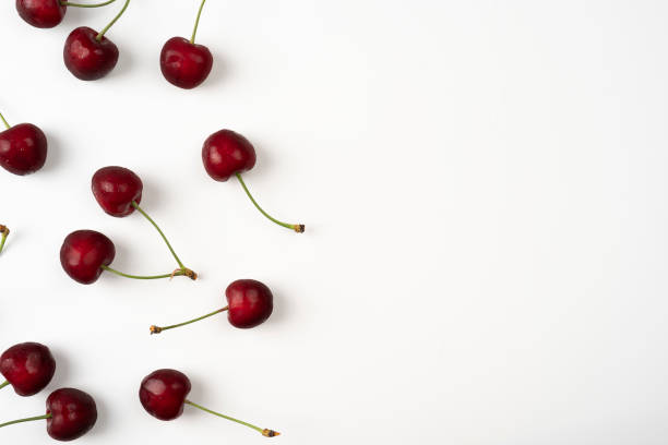 istock Ripe sweet cherry isolated on a white background, closeup 1329540171