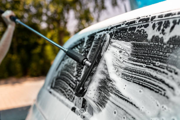 istock manual car wash - cleansing 1329543578