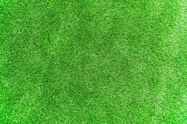 istock Green artificial turf. Artificial grass background, Top view of artificial grass background. 1329546149
