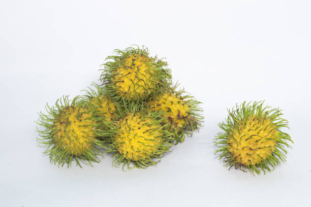 istock Yellow litchi in white background 1329546169