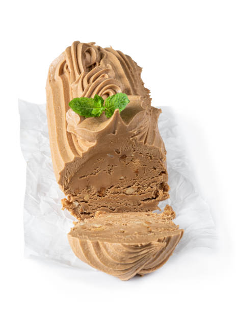 istock Nougat caramel butter fudge cake isolated on white background 1329549774