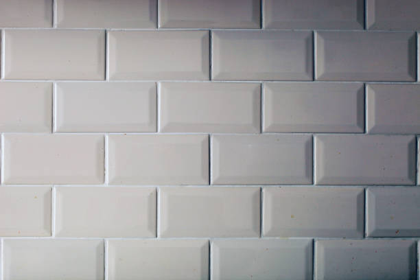 istock light tile brick, laid out with white seam in an even checkerboard pattern. 1329550523
