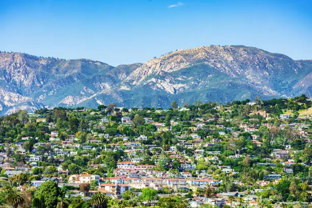 Scenic view of an upscale residential neighborhood on slopes of Santa Ynez Mountains range in Santa Barbara, California.