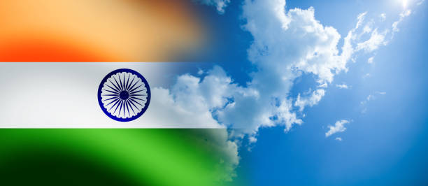 istock Indian flag waving on the blue cloudy sky background. India Independence day. 1329559152