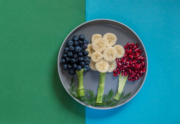 istock food creative ideas, trees made from fruit pieces, breakfast for children 1329561186