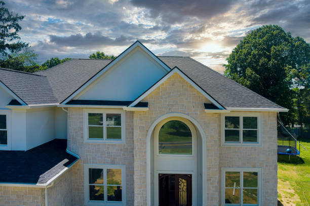 istock Rooftop in a newly home constructed showing asphalt shingles multiple roof lines 1329561521