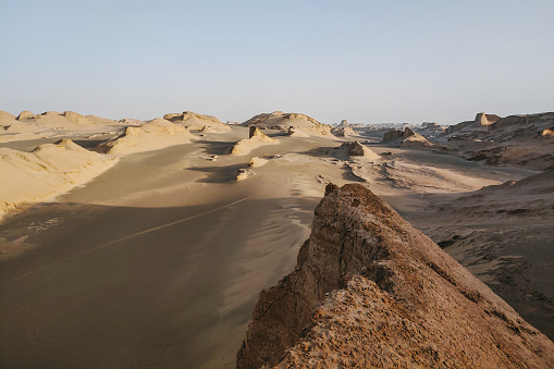 A horizontal shot of Kaluts desert in Kerman, Iran. Travel concept
