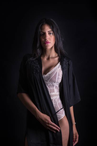 istock Young woman, in underwear. Studio photography. 1329565328