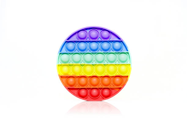 istock Antistress rainbow pop it fidget on white background 1329565396