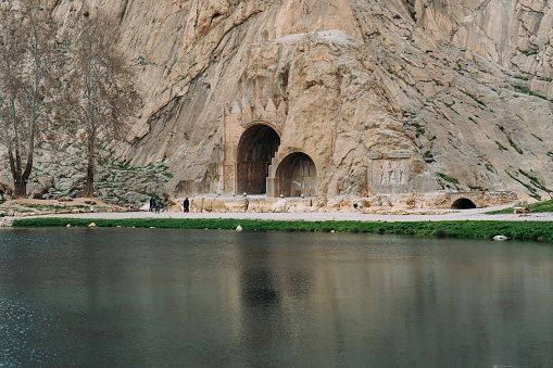 The Taq Bostan arch in Kermanshah, Iran. Tourist destinations concept
