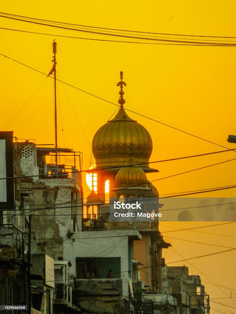 Vertical aerial shot of Chandni chowk in Old Delhi, Delhi under yellow sky A vertical aerial shot of Chandni chowk in Old Delhi, Delhi under yellow sky. Travel concept Architecture Stock Photo