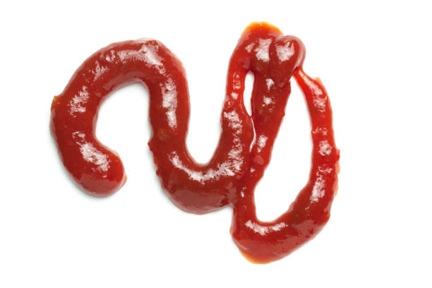 istock fresh bright red splash of tomato sauce isolated on white 1329566702