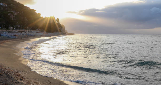 istock Scenic view of Mediterranean beach at sunrise 1329570954