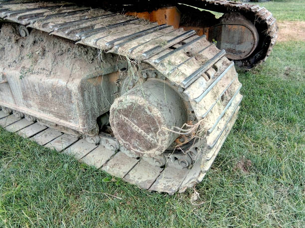 istock the tracks of an excavator 1329573837