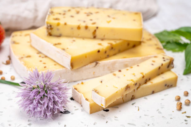 istock Cheese collection, matured cow cheese with mustard seeds from Belgium 1329574895