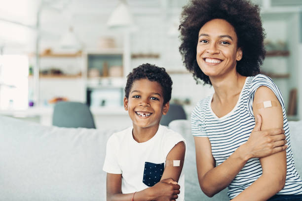 istock Smiling mother and son got vaccinated 1329575920