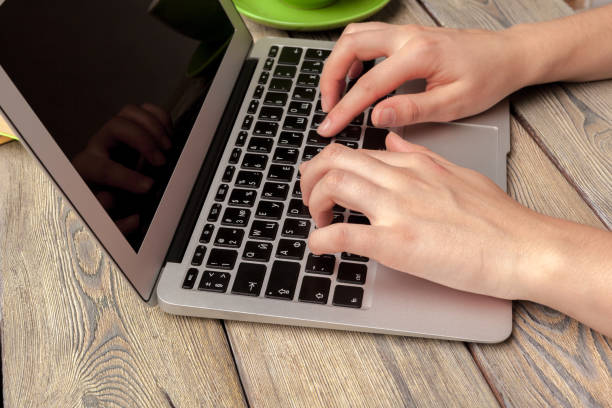 istock Laptop Coffee Cup Office Concept close up 1329575936