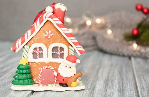 istock Gingerbread house on the christmas table with copy space 1329578518
