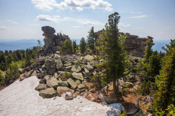 istock Remnants pillars on Mount Zelenaya. Sheregesh, Russia 1329580837