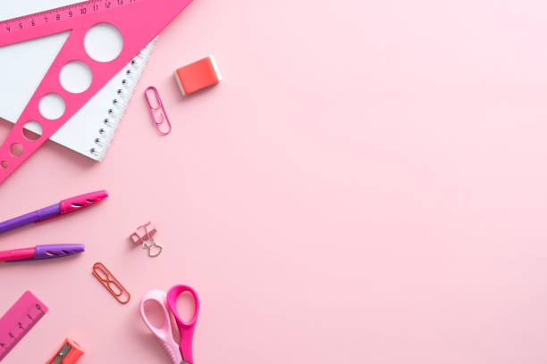 istock School stationery on pink background top view. Flat lay minimal style composition. Back to school concept. 1329580917