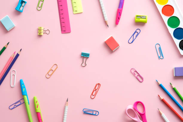 istock School supplies on pink background top view. Creative layout with school stationery. Back to school concept. Flat lay. 1329580924