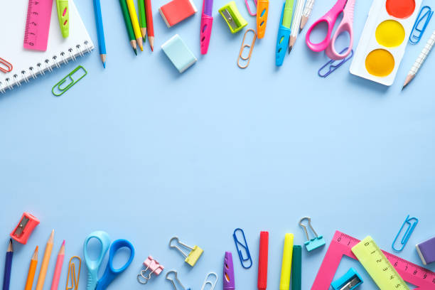 istock School supplies double border frame on blue background. Back to school concept. Flat lay, top view, overhead. 1329580993