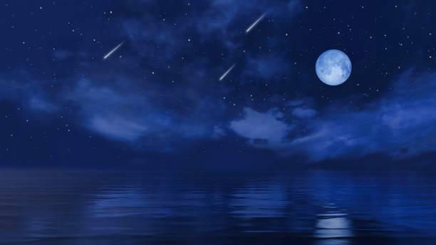 istock Full moon and falling stars above calm night ocean 1329590135
