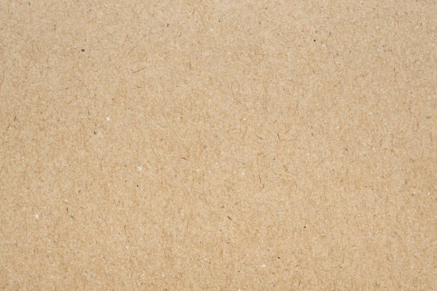istock Brown paper recycled kraft texture background 1329596775
