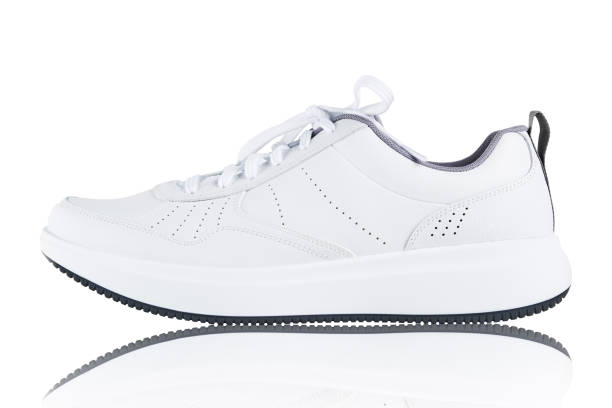 istock Sneaker isolated on white background. New unbranded sport shoe 1329602291