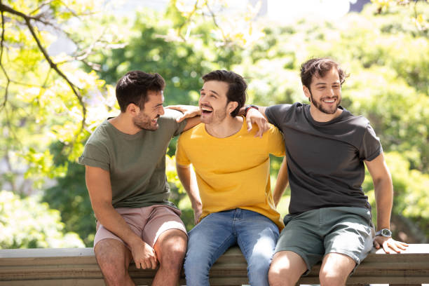 istock Three young men making self portraits and having fun at Buenos Aires 1329606359